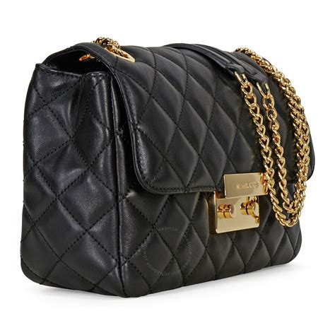 michael kors side saddle bag|Michael Kors quilted black bag.